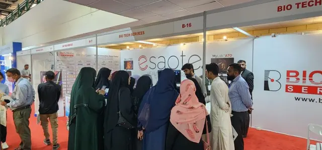 Students at the Esaote stand