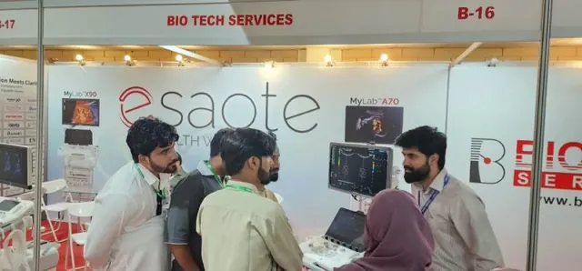 Demonstrating an Esaote system to visitors