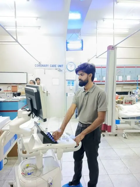Talha setting up the Esaote MyLab A50 in the coronary care unit