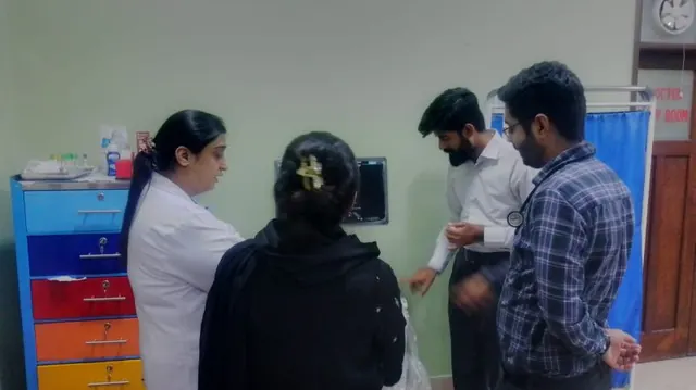 Discussing the system with the SICHN team